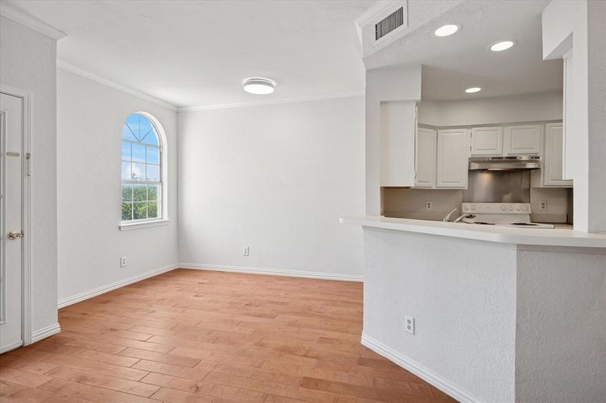 Nicely maintained 1 bedroom, 1 full bath and 1 half bath condo. The open floor plan on the main floor has a cozy fireplace, eating area off the kitchen and has a small covered porch with additional storage. The primary bedroom suite is upstairs with a living space off the bedroom, perfect for a home office. HVAC replaced in 2024, newer flooring upstairs. The community has gated access and a nice pool. The unit has an assigned parking space in the gated parking garage. Very close to Addison and the shopping, restaurants and nightlife that it offers. Close to the Dallas North Tollway for an easy commute to both DFW airport and Love Field. This unit is perfect for a lock and leave option for a busy traveler.