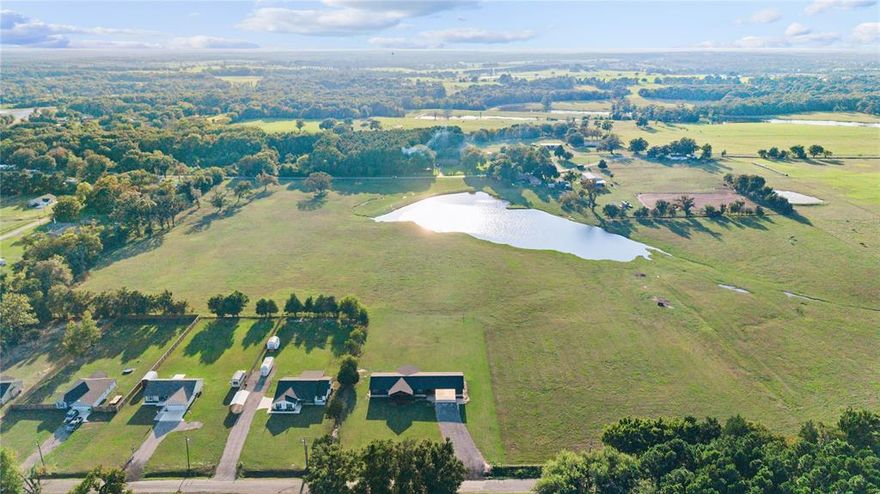 Move-in ready and fully remodeled, this custom stick-built home sits on just over an acre with unobstructed views of open pasture and a peaceful pond. Located on a quiet country road in the desirable LaPoynor ISD, you're just 10 minutes from Athens and 30 minutes from Tyler—offering the perfect blend of country peace and town convenience. This 3 bed, 2 bath home has been completely updated with a new roof, new siding, new aerobic septic system, fresh paint throughout, and luxury vinyl plank flooring—just to name a few. The kitchen is a dream for anyone who loves to cook or entertain, featuring double ovens, double dishwashers, a warming drawer, and a commercial-size fridge and freezer, all set off by gorgeous granite countertops. Both bathrooms have been refreshed with marble countertops and modern finishes. There’s a spacious mudroom and laundry area that’s wide open for you to personalize and make your own—whether you want extra storage, a butler’s pantry, or something totally unique. Enjoy the quiet surroundings from the large covered deck, perfect for morning coffee or evening sunsets. The 30x32 carport includes a 240 sq ft storage room, offering plenty of space for tools, equipment, or hobbies. Everything’s been done for you—just move in and enjoy the view! 

Currently operating as a successful Airbnb and VRBO with consistent rental performance. All furnishings are available for purchase separately, allowing buyers to step right into a move-in ready opportunity.