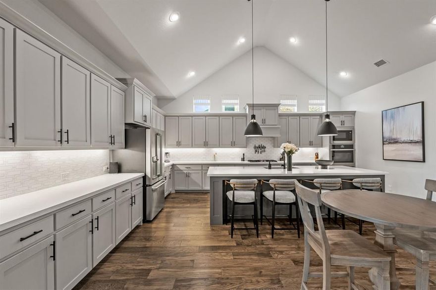 $10k YOUR WAY! RATE BUY-DOWN, CLOSING COSTS, OR OFF THE PRICE! This stunning Perry Home is situated on a generous .26-acre lot in sought-after Canyon Falls Village. Perfectly blending sophisticated design with a warm, inviting ambiance, this residence is ideal for those seeking luxury, comfort, & convenience in a neighborhood that truly feels like home. 

This home offers four spacious ensuite bedrooms. Each bedroom provides a private retreat with its own dedicated bathroom, offering ultimate comfort for family & guests alike. The home is modern, with a lofty design & warm finishes. It also features soaring ceilings, abundant natural light, & open-concept living spaces that strike the perfect balance between sleek modern style & cozy elegance. Pay attention to the engineered wood floors as you tour the home. They are durable, beautiful & seamlessly flow throughout the main living spaces, adding timeless sophistication to the interior. This chef's kitchen is perfectly designed for entertaining AND everyday living; featuring premium finishes, abundant cabinetry, & high-end appliances to inspire your inner chef. The three-car tandem garage, with epoxy finish, includes a 100 sq. ft. bump-out for additional storage...perfect for hobbies, sports equipment, or your refrigerator or deep freezer. This stunning home backs to a serene green space & delivers rare privacy & a beautiful natural backdrop for morning coffee or evening gatherings. 
 
Located in a newer, diverse, & walkable community, this home offers easy access to top-rated Argyle ISD schools (see photos), scenic walking trails, parks, & a variety of nearby amenities—all just steps away from your front door. While Argyle maintains its small-town charm & peaceful surroundings, it’s also growing thoughtfully, featuring essential commercial conveniences that make daily living effortless without sacrificing the tranquil feel of the area. Argyle itself remains a hidden treasure in North Texas. Come see for yourself!