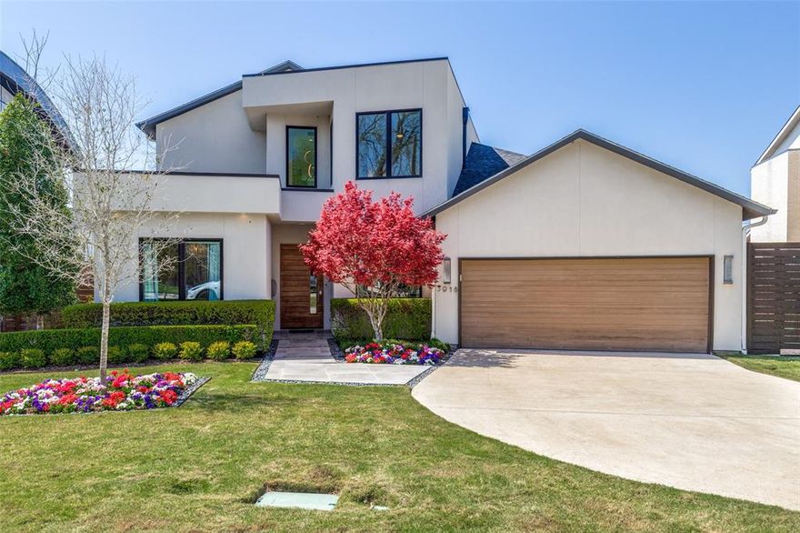 Experience the epitome of modern sophistication in this breathtaking contemporary pool home which features two bedrooms & an office on the main level. The moment you enter you are embraced by a soaring foyer, adjacent is an elegant dining room capable of hosting large dinner parties, and completed by a built -in buffet. A sleek, contemporary wet bar serves as an inviting focal point to welcome guests. This, as every detail in the home, whispers of luxury, from the refined finishes to the thoughtful design, creating an unparalleled sanctuary. As you move into the living room, the very heart of this refined open-concept residence you are greeted by a rich bespoke wall of wood that infuses the space with a sense of intimacy and artistry. These elements harmonize effortlessly with crisp modern lines and a striking black marble fireplace. Beyond the wall of windows , the  meticulously crafted pool, adorned with limestone, evokes a luxurious European escape. This tranquil oasis is extended by a pristine turf lawn, bordered by towering  Savannah Holly trees and Junipers that impart a sense of timeless grandeur. Stepping into the house we enter the kitchen  with its built-in refrigerator  & Kitchen Aid appliances harmonizing seamlessly with custom cabinetry that exudes both  modern design. The primary suites' oversized windows frame tranquil views of the pool and garden, while the spa- inspired bath, clad in stately marble, is a true retreat, featuring  two vanities and walls of mirror.  Each detail has been curated for an unparalleled sense of luxury and comfort. As we ascend the open staircase to the large loft  we enter an exciting family room designed by Nikki Chu featuring contemporary built-in cabinetry .  In addition to the game room we find two additional bedrooms and two additional full baths .  The garage is a multi functional hub for the golf enthusiast with its golf simulator.  The epoxy floors are perfect for easy maintenance. This is Midway Hollow at its best!