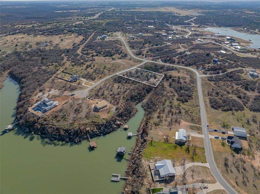 Don't miss your chance to own property on the coveted Hidden Shores Drive at Lake Cisco, Texas! This 1.08-acre lot offers a picturesque setting with beautiful oak trees, scattered cedars, and a seasonal creek that adds charm and character. Conveniently located just over an hour from DFW and only minutes from the interstate, this serene community provides the perfect escape from city life. The HOA, with a low annual fee of $250, ensures well-maintained streets and offers exclusive access to a private community boat dock and boat ramp. Call today for more information!
