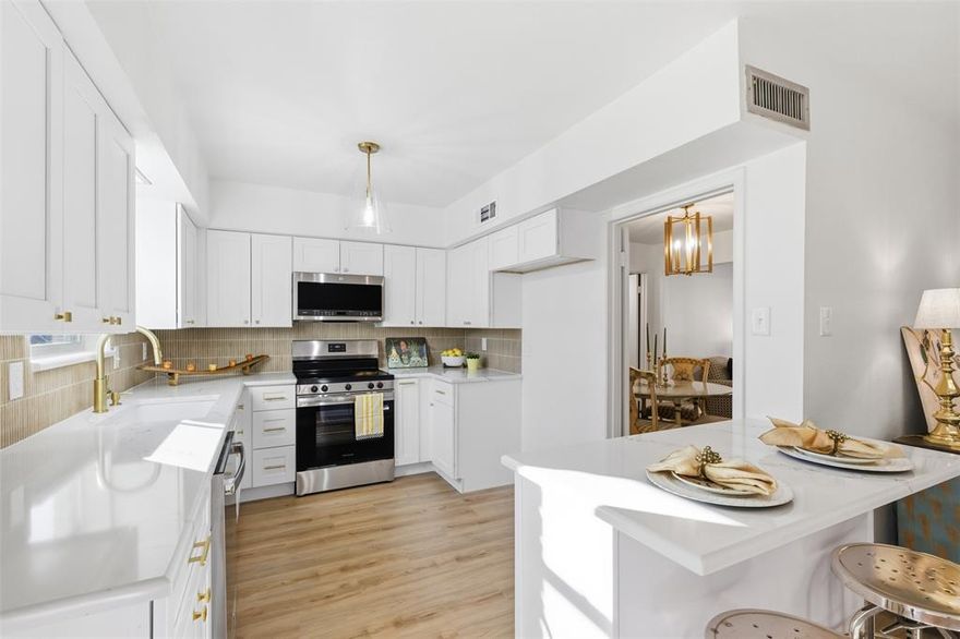 Affordable luxury in central Dallas location. Completely updated first floor unit in Wiliiamsburg 02, a well managed HOA. Featuring 2 bedrooms, 2 full bathrooms, dining area and in unit laundry. Top to bottom updates include electric, floors, kitchen, appliances, new bathrooms and in unit laundry closet. Windows, designer lighting, kitchen cabinets and countertops. HOA updates include recent roof, electrical service, foundation, landscaping, pool and pool house updates. Monthly HOA covers water, sewer, exterior pest service and VALET Trash pickup.  Move in ready. Walk to Central Market, restaurants, SMU, etc.  2 reserved parking spaces and private fenced patio.