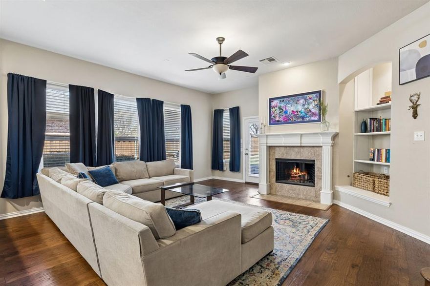 Set in sought-after Aspendale Village in the Stonebridge Ranch Community and zoned for top-rated Frisco ISD schools, this spacious two-story home has it all. One of the only homes with a fifth bedroom, dedicated office, upstairs game room AND dedicated media room, there’s truly space for everyone. The updated kitchen offers custom white cabinetry, quartzite countertops, mosaic backsplash, and a convenient island for additional counter space and storage. In the breakfast nook, you’ll find built-in bench seating to maximize the space and a panty to store all your staples. The kitchen opens to the family room where you’ll find a wall of windows that fill the space with natural light, a recessed built-in bookcase with fireplace and hardwood flooring. In the primary suite there’s another incredible wall of windows, an ensuite bathroom with dual vanities, a separate shower and soaking tub plus a walk-in closet so big you might just throw a dance party. Three additional bedrooms are just down the hall with a conveniently located bathroom that truly maximizes the space. A color-drenched office with French doors for privacy sits at the front of the home and a true formal dining room creates separation from the work and living spaces. Upstairs you’ll discover a huge game room with room for all the toys, a true media room that could also be used as a second office, workout room or studio and the fifth bedroom. The bonus bedroom upstairs has an ensuite bathroom making it the perfect place for overnight guests, older children or even an au pair. The backyard is professionally landscaped with room to roam or in the case of pets, a solid space to get the zoomies out. The covered porch is fabulous, shielded from the sun and primed for an outdoor living area - just add a TV and call it a day.