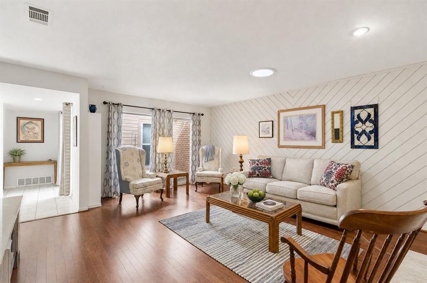 Tucked inside the established Windemere community of North Arlington, this thoughtfully designed garden home offers a low-maintenance lifestyle just minutes from AT&T Stadium and Arlington’s Entertainment District.

A gated front entrance leads into a private courtyard—perfect for morning coffee, quiet evenings, or hosting friends in a more intimate outdoor setting.

Inside, soaring ceilings and expansive windows bring in natural light and create an open, inviting feel. With over 1,900 square feet, the layout offers both functionality and comfort. Hardwood floors run through the main living areas, complemented by a cozy wood-burning fireplace and a wet bar that adds just the right touch for entertaining.

The kitchen features ample cabinetry and flows easily into the dining and living spaces, making everyday living feel seamless.

The primary suite is located downstairs for added privacy and convenience, complete with an updated en-suite bathroom featuring dual vanities, granite countertops, and a walk-in shower. Upstairs, you’ll find two additional bedrooms, a full bath, and a cozy loft area—ideal for a reading nook, home office, or small workspace.

Additional highlights include a full-size laundry room, generous storage, and a spacious garage.

Well-located, easy to maintain, and full of character—618 Castlewood Drive is ready for its next chapter.