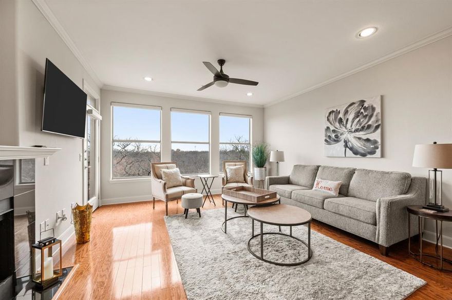 Enjoy lakefront living at its finest in this beautiful 3-bedroom, 2-bath condominium at Water’s Edge on Lewisville Lake. Light and bright throughout, this inviting home features an open-concept layout with wood flooring in the living, dining, and kitchen areas, and granite countertops in the kitchen—perfect for both everyday living and entertaining. Step out onto your private balcony and take in peaceful lake views, complete with automatic shades for added comfort and convenience. Additional automatic shades inside the home provide both privacy and ease of use. The spacious primary suite and well-appointed secondary bedrooms offer comfort and flexibility for guests, family, or a home office. Recent updates include a new AC system installed in 2025, offering peace of mind for years to come. Convenience is key with two prime covered parking spaces located near the elevator. Residents enjoy resort-style amenities including a community clubhouse, pool and spa, and fitness center. Ideally situated with easy access to Denton, Grapevine, Dallas, and Frisco, and just a short drive to DFW Airport, this home offers the perfect blend of relaxation and accessibility. Don’t miss your chance to experience lakeside living at Water’s Edge!