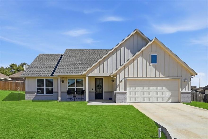 Charming modern farmhouse style home is situated less than 5 miles from Granbury's historic town square. Don't miss this well laid out 3 bedroom floorplan.  The coffered ceiling in the living room lends a touch of elegance, while the well appointed kitchen is the perfect hub for family meals and entertaining.  It is complete with a generous island and lots of cabinet space.  The large primary suite boasts a charming barn door to its ensuite bath outfitted with dual sinks and a large shower.  Two bedrooms and a full bath on the opposite side allow for privacy.  The mud room is conveniently located off the garage and utility room.  A large backyard and a covered front porch are perfect for enjoying the spring breezes. Meander Estates is a peaceful, family-friendly neighborhood in Granbury, TX. Known for its spacious homes, well-kept lawns, and a community lake, it's a great place for those who enjoy outdoor activities and a quiet, suburban lifestyle.