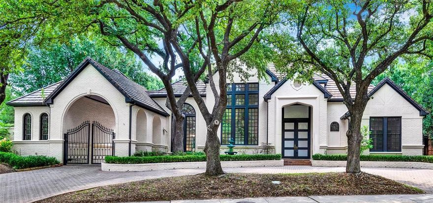 Be enchanted with this striking soft contemporary home in a guard-gated neighborhood nestled in far North Dallas minutes from DNT and 190. Completely renovated in 2022 by Designs by Alla, this home has it all: white oak and marble floors, floating staircase in the foyer, updated plumbing and so much more. Every room and bath has been remodeled! Most impressive are the kitchen with upgraded Fulgor appliances, island with exotic stone waterfall, and 100 bottle wine fridge; and the primary bedroom and bath with a custom closet, custom mirrors, double shower, custom cabinetry and counters and amazing pool views.  3 Car Garage including 1 single bay with AC, ballet bar, mirrors and high end vinyl flooring). Agents MUST present a business card or guard will not allow them through. TY!