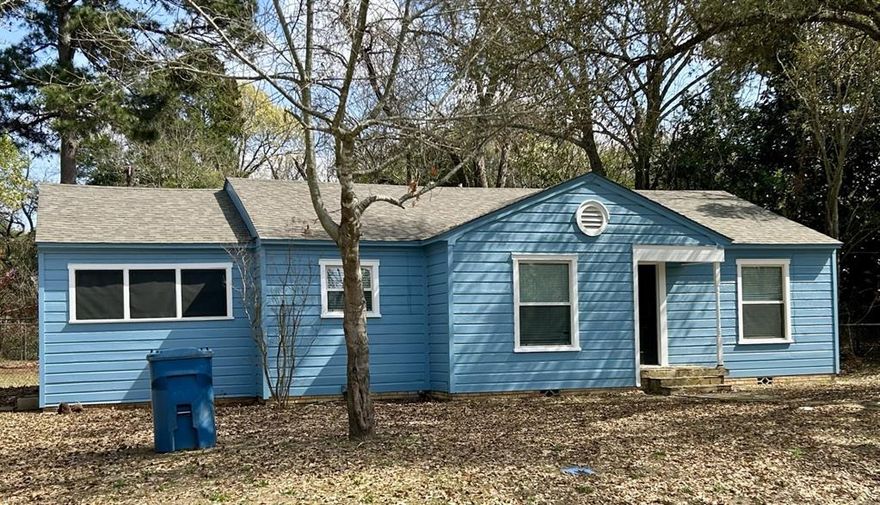Step into this inviting 3-bedroom, 1-bath home that blends classic charm with thoughtful updates. The living area features beautiful original hardwood floors, creating a warm and timeless first impression, while each bedroom offers brand-new carpet for added comfort. A charming kitchen anchors the heart of the home, and a spacious den provides the perfect spot for relaxing, entertaining, or creating a second living space. The dedicated laundry room adds everyday convenience. Outside, enjoy a large, fenced backyard with a covered deck, ideal for gatherings, grilling, or simply unwinding in your own private outdoor retreat. The home sits on a quiet street and has been freshly painted on the exterior, reflecting its well-maintained condition inside and out. Move-in ready and full of character, this home is a standout in great condition.