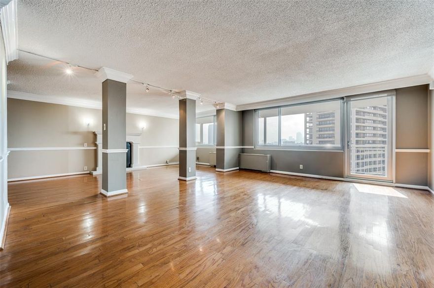 EXCLUSIVE RENTAL OPPORTUNITY : A custom floorplan seamlessly merging two units into an exceptional home within an iconic Dallas High Rise. This remarkable property effortlessly marries luxury and functionality. Spacious living spaces feature open floor plan, hardwood floors and Crown Moldings, creating an elegant atmosphere complemented by walls of windows framing panoramic city vistas. On one side of the condo is the
Main Bedroom with a sitting area and a spacious ensuite bathroom. On the opposite side is the second bedroom with an attached office space and ensuite bath for added convenience. Discover a gourmet kitchen with a gas range, granite counters, butlers pantry, and beautiful cherry cabinets. Dry bar and wine refrigerator. Ample storage is provided with abundant closets and and built ins throughout the residence, and a private 32 ft long
balcony on the 15th floor becomes your urban oasis.