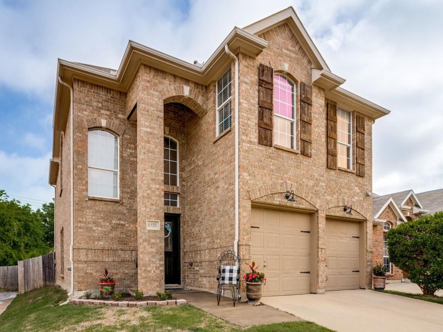 ***REDUCED AND PRICED TO SELL THIS BEAUTIFUL HOME!! SELLER RELOCATING!*** BEAUTIFULLY UPDATED HOME IN GATED COMMUNITY NEAR LAKE ARLINGTON, GREAT CURB APPEAL! Situated on gated cul-de-sac street! Numerous updates, too many to mention here, but be sure to see pictures! 2 living, 2 dining 4-bedroom home with AMAZING, NICE, HUGE covered patio and deck, 2 ample seating areas! Large Living area features gas fireplace, and wall of windows overlooking back yard, patio!  Island kitchen with storage includes gorgeous cabinets, granite counters, tiled back splash, gas cooktop, pantry! Adorable children's nook for their own little private space, or would be great for luggage storage! Large primary bedroom with room for desk or sitting area! Primary Bathroom has 2 sinks, vanity, large oval tub with separate shower! 2nd large living up, perfect Game Room or exercise room! Minutes to highways and plenty of shopping, restaurants. 15 minutes to downtown Fort Worth, 35 minutes to Dallas, 20 minutes to DFW airport and UTA University. THIS ONE IS A BEAUT, CLARK - expected to sell quickly, so don't miss out! (several items and furniture for sale - ask listing agent)