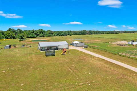 Photo of 2244 County Road 3303, Greenville, TX 75402 (MLS # 21347733)