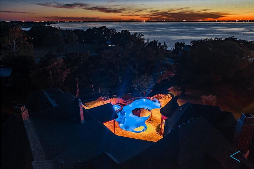 SPECTACUALR 5553 SF 1 Story! Awesome interior layout & A RESORT INSPIRED backyard you'll never leave. 5 bed(3 w-pvt bths),4 full bths,2 half bths, Private gated drive & huge motor court, 5 CAR GAR(two will accommodate car lifts) Private office, Gorgeous Island kitchen w-Quartz & Polished Granite farm sink, Massive living w-vaulted beamed ceilings. Features..Custom see-thru aquarium, His&Her Mst Closets & His&Her commodes, Plantation Shutters, Dog yard, generator ready, oversized mud room, WI pantry, huge Utility Rm, walk out storage, mini glass garage door opens to outdoor grilling area. Outdoor shower, huge remodeled pool w-slide & huge spa. Elec sun shade for outdoor liv area w-fireplace plus so much more!!