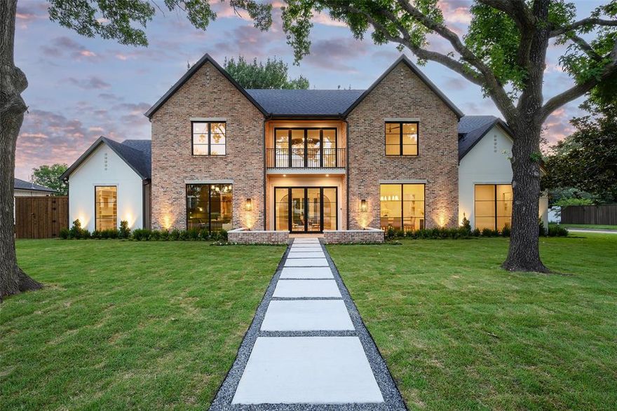 With five bedrooms and 5.2 bathrooms, a home office, and ample space for a family game room spread over 5,583 square feet on a lovely, secluded lot, this new construction is grand, chock full of “wow” factors at every turn. The home’s innovative contemporary design wisely anticipates future living needs, like a convenient laundry room in the master closet and a large integrated safe room for luxury items, rare for homes at this price point. The kitchen is spacious, with a sizable butler’s pantry and plenty of extras, opening to the dazzling backyard oasis with a luxurious covered patio, a shimmering pool, and a roomy three-car garage. It is a walkable neighborhood, blocks away from top private schools, with easy access to the North Dallas Tollway and other important Dallas thoroughfares. The top-notch team includes architect Bob Anderson; builder Gary Arneson, Arneson Custom Homes and designer Cesarina Johnson, House of Moxie.