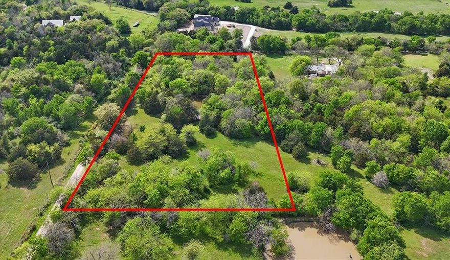 Everyone is searching for 5 acres in Hunt County, TX to build a barndominium, custom home, or family compound—and this property delivers. This AG-exempt, horse-friendly 5-acre tract offers the ideal blend of usability, privacy, and long-term value. Located in unincorporated Hunt County with a Greenville mailing address and Celeste ISD, featuring NO HOA, NO city taxes, No floodplain, water and electric available at the road, and gentle deed restrictions to protect your investment while maintaining flexibility. The Seller is motivated and says you will love it here.

The land showcases Crockett loam soil, well-suited for grazing, livestock, and agricultural use, making it ideal for those seeking a rural lifestyle with functionality. With dual road frontage on County Road 1037 and County Road 1196, access is convenient and flexible. Enter through the gate on CR 1196 and follow the natural lay of the land to a beautiful elevated homesite overlooking a pond, offering scenic views and a peaceful setting.

Surrounded by a mix of open land and well-maintained neighboring properties, including a new custom home across the street, this tract reflects the area’s growth while preserving its rural charm. Enjoy abundant wildlife including whitetail deer, open skies, and room to expand, perfect for a homestead, recreational retreat, or long-term investment.

The property is currently AG exempt, helping reduce property taxes. The tract is in the Hunt County platting process, creating a clean path for development.

Strategically located with easy access to Greenville, Farmersville, McKinney, and Sherman, and just a short drive to the future Collin County Outer Loop and McKinney National Airport, this property offers both rural tranquility and strong growth potential. Nearby attractions include the Chaparral Trail for horseback riding, hiking, and outdoor recreation. Information deemed reliable; buyer to perform due diligence. Boundary lines are approximate.