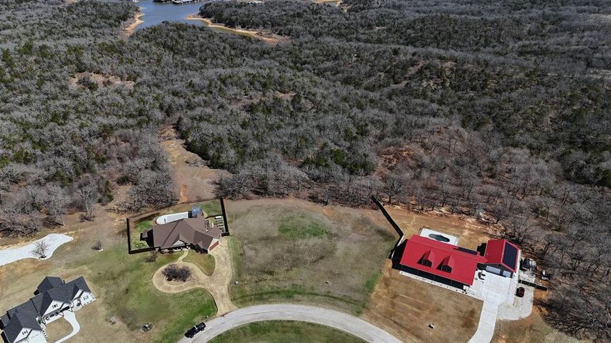 LOCATION LOCATION LOCATION. This nearly 3.6 Acre lot is located within the tight nit gated community of Texoma Bluffs. This parcel is conveniently located only 7 minutes from Cedar Bayou Marina and backs up to Corp of Engineers owned property. You will be near tons of amenities including gorgeous Lake Texoma, boating, fishing, swimming, hiking, and campgrounds. This ideal lot has been partially cleared for you to build your dream home while preserving nature surrounded by lush greenery. Check it out today!