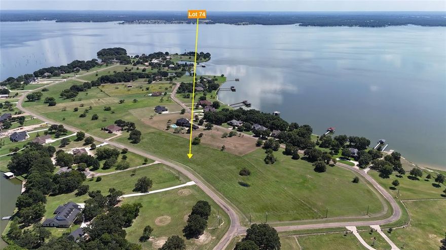 Lake life dreams start right here! This 1.11-acre lot (48,352 sq ft) sits front and center on a gorgeous peninsula, serving up wide-open water views that will stop you in your tracks. The lot is already cleared and ready for your custom 2,000+ sq ft lake home—picture a sparkling pool out back, an outdoor kitchen for grilling and chilling, a cozy fire pit for late-night hangouts, and plenty of space left over for yard games, pets, or just stretching out and soaking in the views. This gated subdivision is all about comfort and convenience with smooth paved roads, community mailboxes, and even a private boat ramp just for owners. Load up the boat, jet skis, kayaks, paddleboards, and every water toy you’ve got—because this is where lake days turn into lake weekends and then into a lifestyle. When you’re ready to dry off, Corsicana is just a short drive away with shopping, dining, and a fun little downtown that’s perfect for date nights, family dinners, or just grabbing a treat. And if one lot isn’t enough? Neighboring lots are available so you can spread out and build the ultimate lakefront compound with room for everyone.