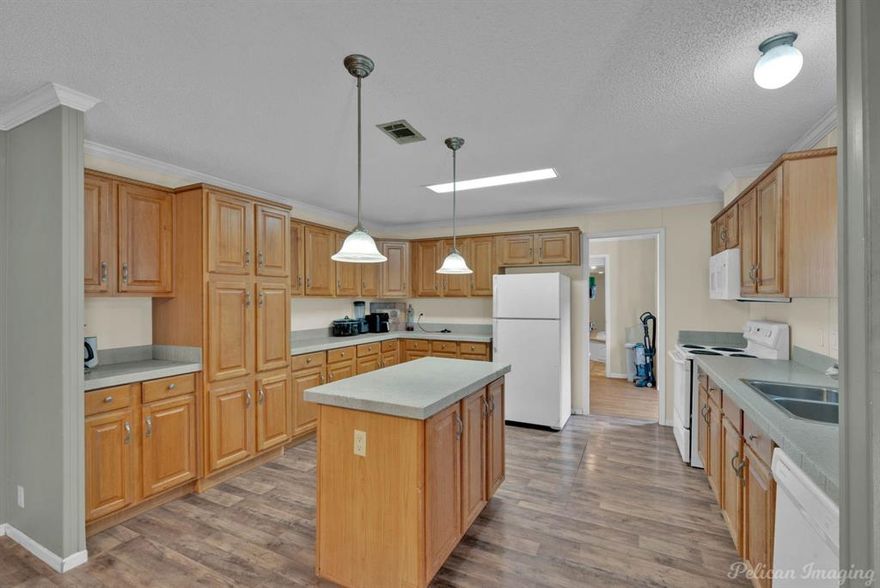 Looking for room to spread out? This 3-bedroom, 2-bath home is easy to show and sits on almost an acre in peaceful Princeton, LA, giving you plenty of space inside and out. Step inside and you’ll find big, welcoming rooms with an open layout that makes everyday living a breeze. Two separate living areas give you options — host family and friends, or just kick back and enjoy a quiet evening. The kitchen flows right into the living spaces, so you’ll never miss out on the action while cooking. The primary suite is large and relaxing, perfect for unwinding after a long day. The two additional bedrooms are roomy too, making them great for family, guests, or even a home office. A handy utility room with its own sink adds extra convenience. Outside, you’ll love having almost an acre to call your own. There’s a huge storage building, shop with electricity (workshop, anyone?) plus a two-car carport to keep your vehicles protected. Whether you’re into gardening, projects, or just enjoying the fresh air, this property has the space to make it happen. Come see how easy country living can be — with all the comfort you need right at home!