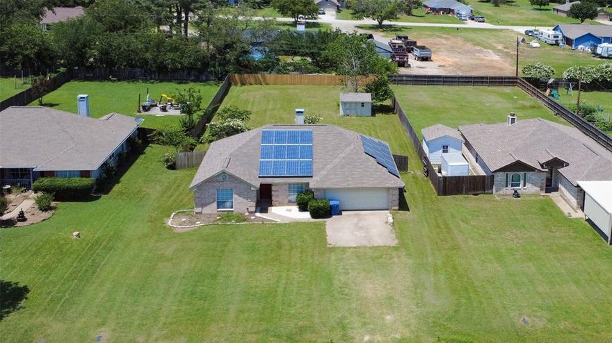 Discover this beautifully updated 3-bedroom, 2-bathroom home featuring a warm, open-concept layout and peaceful, country-style living—just minutes from local restaurants, shopping, and conveniences. Enjoy brand-new vinyl flooring and fresh paint throughout, along with a spacious kitchen and split-bedroom design.

This home is equipped with solar panels offering true energy efficiency—with no equipment fees or maintenance costs. Simply pay for the power you use!

Outside, the expansive yard provides endless possibilities for gardening, entertaining, or relaxing under the stars. As a bonus, residents enjoy exclusive access to a community pool and a nearby boat dock—perfect for weekend fun and leisure.