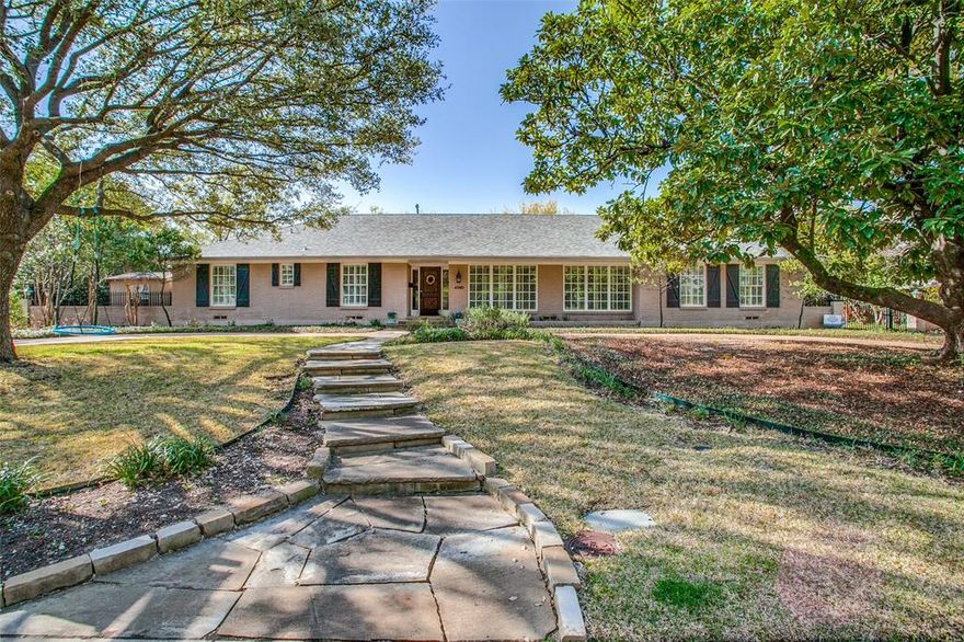 Preferred street in Hockaday subdivision.Withers Elementary zone.Beautiful traditional.Circle drive.Elegant entry.Hardwood floors.Plantation Shutters.Formal living & dining.Large den with fireplace opens to breakfast rm & kitchen.Gourmet kitchen.Gas cooktop,wine cooler,built-in Viking  refrigerator,dishwasher,& double ovens(1 convection).Large Master bdrm with doors to backyard & patio.Great walk-in closet.Bdrms 2 & 3, with Jack & Jill bath,on hall with Master bdrm.Bdrm 4 & full bath is split for guest rm or office.Wonderful utility-mud room,built-in cabinets.Large covered patio.Board on board fence.Pier & beam foundation.Security system.2 car attached garage.Automatic gate to driveway.