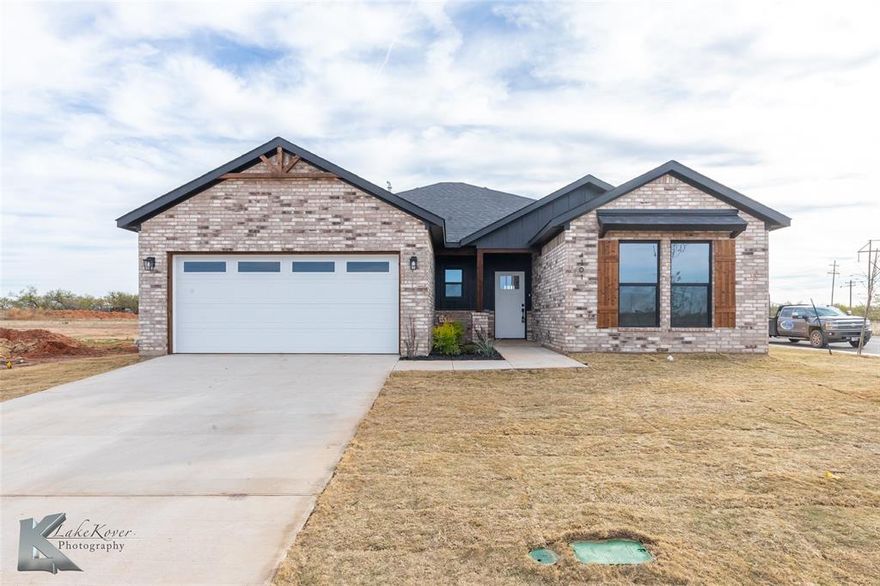 Welcome to Water Crest Ranch, a brand-new subdivision where modern living meets West Texas charm. This new build 3-bedroom, 2-bathroom home offers the perfect blend of style, comfort, and convenience in one of Abilene's most exciting new communities. Inside, you'll find a bright open-concept layout with high-quality finishes and thoughtful details throughout. The inviting electric fireplace adds a cozy focal point to the living space, while the modern kitchen flows seamlessly into the dining and family areas — ideal for entertaining or relaxing at home. Enjoy all the benefits of new construction including energy-efficient systems and brand-new appliances including gas range and tankless hot water heater. Whether you're starting fresh or settling down, Water Crest Ranch offers both comfort and convenience. Schedule your tour today and be among the first to call Water Crest Ranch home!