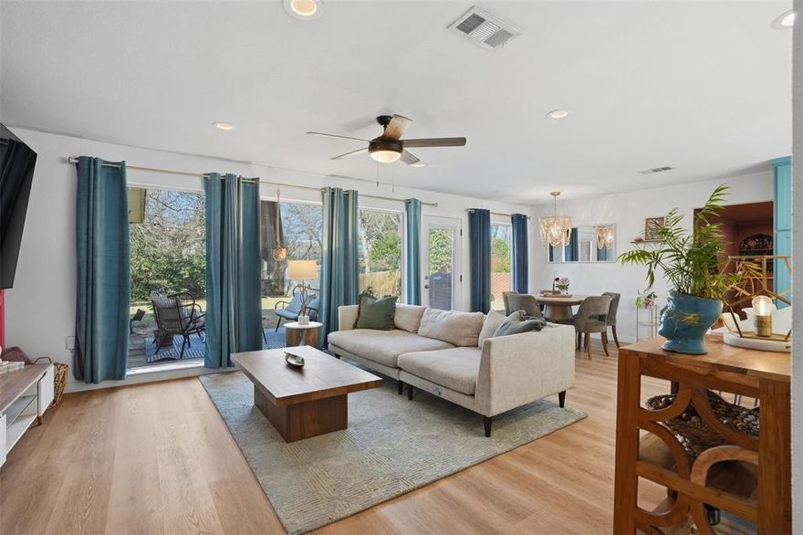 Completely remodeled to the studs, this stunning mid-century modern home tucked away in the sought-after Forest Park neighborhood of North Arlington delivers the rare combination of modern construction quality within an established, tree-lined community with no HOA. Originally built in 1954, this 3-bedroom, 2-bath residence underwent a comprehensive renovation from 2021–2023, replacing nearly every major component & creating the feel of a newly built home.

Thoughtfully designed interior features an open-concept layout ideal for everyday living and entertaining. Highlights include custom cabinetry, quartz countertops, updated flooring throughout, designer tile bathrooms, and expansive double-pane windows that flood the home with natural light. The kitchen serves as the heart of the home, an entertainer’s dream with abundant storage, custom built-ins & modern finishes.

Beyond the finishes, the behind-the-walls upgrades offer exceptional peace of mind rarely found in homes of this era: new electrical wiring & breaker box, partial new plumbing with PEX water lines 2021, HVAC system 2018, new air ducts and vents 2021, new attic insulation 2021, new drywall, & new expansive windows 2021.

The original garage has been fully finished and converted into an expansive approximately 18’ x 30’ flex space, perfect as a media room, 2nd living area, or multi-purpose retreat features a cozy fireplace and a built-in pull-out bar, creating an ideal setting for entertaining or relaxed family gatherings.

Situated on an oversized 0.267-acre lot, the property offers room to relax, entertain, or expand, framed by mature trees that define N Arlington’s character. While there is no garage, the extended driveway provides ample parking with future carport or garage potential.

Enjoy a central location just minutes from AT&T Stadium, Globe Life Field, Six Flags, & Texas Live!, as well as UT Arlington, golf courses, parks & trails. Easy access to I-30, Hwy 183, 360, & 820. Welcome!