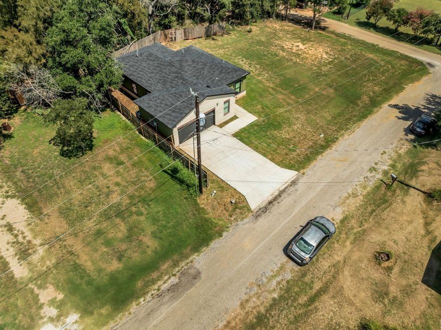 Your dream home with an additional lot next to it, this property also comes with lot 24 next to this house. Talk about lake views, you can build a second home next to this one. This home comes with 3 bedrooms, 2 full bathrooms, stunning quartz countertops and kitchen island. The primary bedroom has walking closets, the master bathroom has a spa-garden soaking tub and a separate shower. This house is a gem to keep and improve. You can watch the stunning sunrise from your porch and the sun gleaming over the river while drinking your morning coffee. The lot next to it is 3200 Lowland Dr or 5750 Parkside Ct.