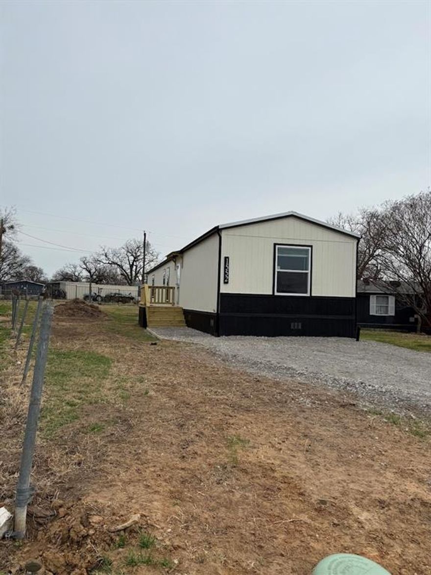 Come and Enjoy the Lake and live in a New 2026 Champion Home with two decks. Split bedrooms, luxury vinyl floors throughout the home and large pantry, refrigerator included! Community has a public boat dock where residents can launch for free and a free public beach and park.