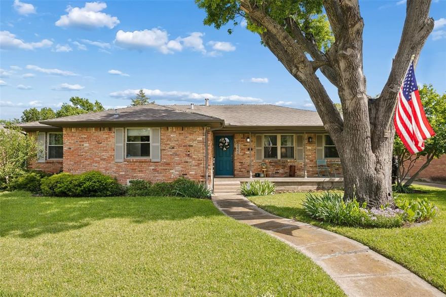 Welcome to a beautifully maintained home located on a quiet street in a highly sought-after neighborhood. Surrounded by lush landscaping and featuring a charming front porch, this home offers inviting curb appeal and a warm, welcoming feel from the moment you arrive. Inside, the home showcases a flexible and functional layout with hardwood flooring and a natural flow designed for both everyday living and entertaining. The kitchen and breakfast room connect seamlessly to a spacious den with built-ins, creating the perfect central gathering space. A formal living and dining room provide additional versatility for hosting, work, or relaxation. Thoughtful updates enhance both comfort and efficiency, including fresh interior paint, updated energy-efficient windows, new ductwork, and new kitchen appliances. Hardwood floors lie beneath the carpet in the bedrooms, offering future potential to further customize and elevate the space. The private primary suite features two generous closets and a well-appointed ensuite bath. Two additional bedrooms are comfortably sized and share a Jack-and-Jill bathroom, making the layout ideal for families, guests, or a home office setup. Enjoy outdoor living in the large grassy backyard, complete with a wood privacy fence and a storage shed for added convenience. An oversized attached two-car garage provides excellent parking and storage options. Perfectly positioned near White Rock Lake, the Dallas Arboretum, and Lakeland Hills Park, this home offers unbeatable access to outdoor recreation and some of East Dallas’ most beloved destinations—while still tucked away in a peaceful residential setting. Blending thoughtful updates, a versatile floorplan, and an exceptional location, this home is a rare opportunity to enjoy comfort, convenience, and lifestyle in one of Dallas’ most desirable areas.