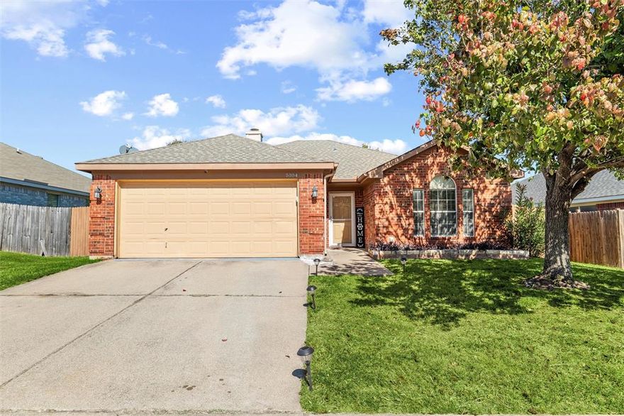 Beautifully remodeled 3-2-2 in an unbeatable location close to everything you need! This home features an inviting open floor plan with a cozy corner fireplace, brick hearth, crown mantel, and sleek vinyl plank flooring throughout. The kitchen shines with stainless steel appliances, granite countertops, and a tumble marble backsplash. Enjoy added touches like crown molding and surround sound. The spacious primary suite offers dual sinks, a garden tub, separate walk-in shower, and generous walk-in closet. Outside, relax or entertain on the large Trex deck overlooking the fenced yard. With a two-car garage and modern updates already complete. Come see this home today!