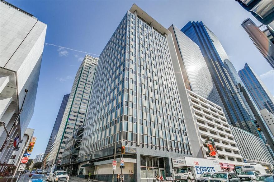 This George Dahl designed Mid-Century Modern building built in 1957 for Dallas Federal Savings was converted to condos in 2002 - the first condo project in the CBD. Enjoy City Views from 4 large windows with views of the Thompson Hotel and other neighboring buildings.  Large same floor storage unit with quick access nearby. Since 2021 the $460million+ National Residences and Thompson Hotel have been located across Akard in the restored First National Bank. 1505 Amenities: 24 HR Concierge-Valet for Residents and up to 5 Guests-no tipping. Amenity floor B-1 caterer's kitchen, wine cellar, party area, piano, darts, pool table, TV. Amenity floor B-2 new Media Room seats 15 and new state of the art Fitness Center with Gym Room and Bike storage. Fifth Floor Resident-Outdoor retreat-Pool, 3 cooking pavilions with gas grills, private dog run, sitting areas. Walk to Flagship Neiman Marcus, Forty-Five Ten, restaurants, hotels, Arts District, AT&T Discovery District with 9 story Video Wall. Dart Akard Station across the street to DFW in 50 minutes, Love Field in 30 minutes, NorthPark far faster than you can drive and park, etc. The ease of a contemporary Lifestyle!