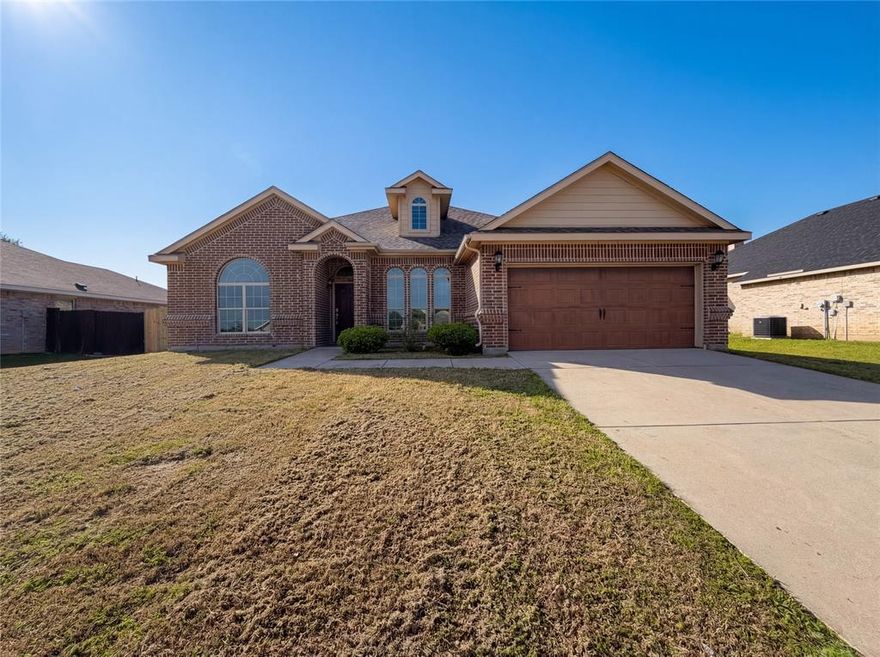 Welcome to 3717 Dutch Iris Ln, a home that exudes warmth and charm. The living room is graced with a cozy fireplace, creating a perfect ambiance for relaxation. The kitchen is a chef's dream, boasting an accent backsplash and a functional kitchen island. The primary bedroom is a sanctuary with a spacious walk-in closet. The primary bathroom features double sinks, and a separate tub and shower for a spa-like experience. The home has a fenced-in backyard,  and space for outdoor activities. The interior has been refreshed with new paint enhancing the overall appeal of the home. This property is a perfect blend of comfort and style, waiting for you to make it home. This property is a perfect blend of comfort and style, waiting for you to make it home. Included 100-Day Home Warranty with buyer activation