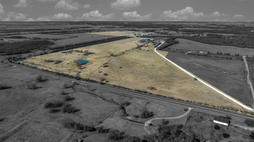 Beautiful 222-acre farm with no floodplain and limitless potential in one of North Texas' fastest growing corridors.
Located outside Sanger City limits and ETJ. 
No Floodplain.
2,220' of frontage on Highway 455.
4,000' of frontage on Clear Creek Rd West.
6 inch Bolivar water line along Hwy 455.
Sale includes parcel numbers: R57477, R59158, R57154, R57500, R498455, R57605, R57589, R57652
Three stock ponds.
260' Deep water well.
No Oil & Gas surface use. 
Lifetime lease in place on the 1-acre existing homestead.

Seller is willing to separate the southern 86-acres.