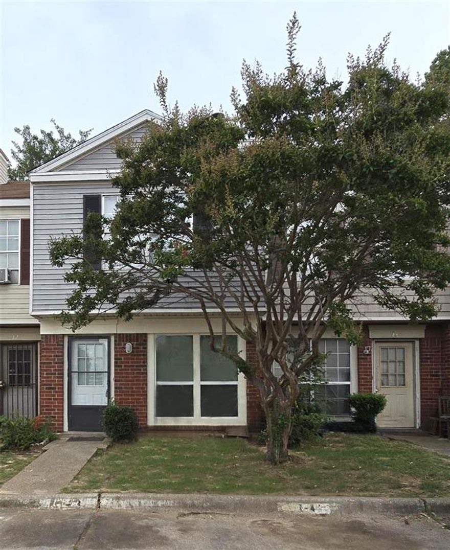 Attention investors—tenant occupied, renovated, and priced to sell. This standout two-story townhome offers a highly rentable floor plan and one of the best locations in the community. The main level features granite countertops, an eat-in kitchen, living area with fireplace, and a convenient half bath. Step outside to a private, south-facing enclosed patio—perfect for low-maintenance outdoor enjoyment. Upstairs, two spacious primary suites each include a full bathroom, making this layout ideal for long-term tenants. Full-size washer and dryer and refrigerator included. Classified as a single-family townhome with mandatory HOA (not a condo). Ideally situated near the park in Unit I-03.