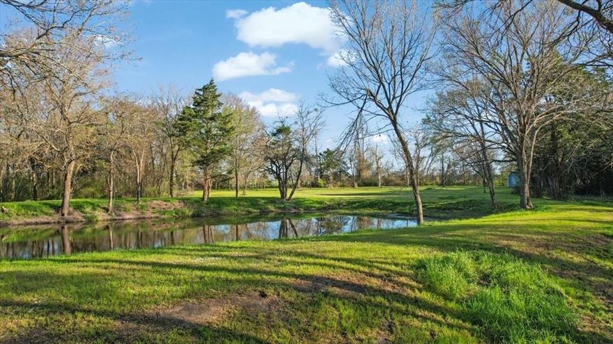 GORGEOUS 2.716+- ACRES Nestled within the acclaimed Caddo Mills ISD!!  This property provides an ideal backdrop for building your dream home.  Enjoy the perfect blend of serene country living with unparalleled convenience. You'll be just minutes from major arteries like I-30 and Hwy 34, ensuring easy commutes. Everyday necessities and leisure are close at hand, with a variety of retail options, delicious restaurants, nearby schools and welcoming churches nearby. The prime location offers incredible accessibility: you're less than an hour from the vibrant city of Dallas and a mere 30 minutes from the charming lakeside community of Rockwall (Lake Ray Hubbard) or Quinlan (Lake Tawakoni).   This is truly a rare opportunity to own acreage offering mature trees and a stocked pond -water feature with Bass, Catfish, and Perch in the area.  This land offers a unique chance to create your personal haven and is perfect for fishing enthusiasts or peaceful contemplation.   Don't miss out on securing this piece of paradise where natural beauty meets ultimate convenience!