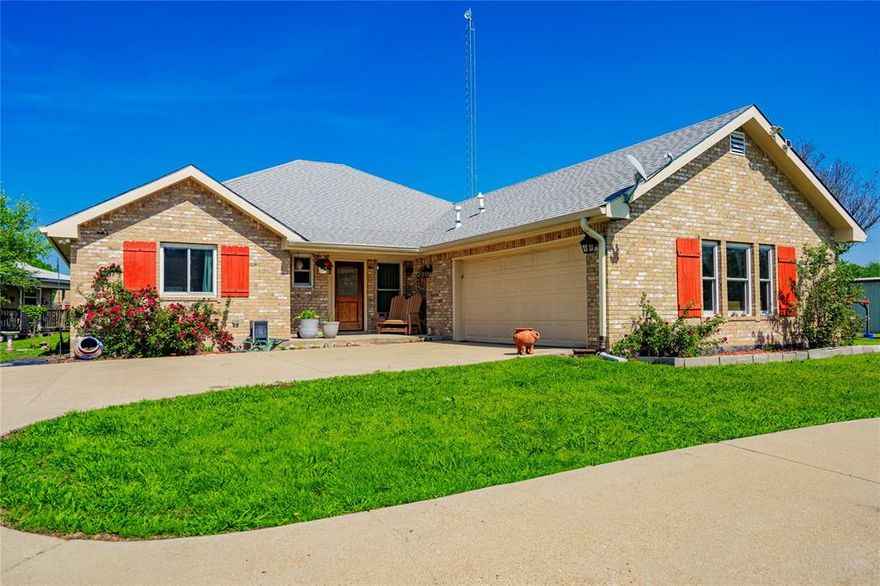 EXTREMELY MOTIVATED SELLER READY TO MAKE A DEAL!!! Country living at its finest! Just minutes from I-45 and 45 minutes from Dallas. The huge yard is a gardener's dream, surrounded by fruit and nut trees. As you step inside, you will be impressed by the large entry leading into the open living room, which features high ceilings, a new gas fireplace, and beautiful new flooring throughout. You'll enjoy the newly renovated eat in kitchen and bathrooms with riverstone flooring. The owner's suite is a true oasis, with many custom builtins and barn doors that lead to a large walk in closet. The owner's bath is massive with custom shower, countertops, and sink. When stepping out back, there is a covered and open patio, an art studio that could be used as a theater, office, or she-shed. There's an additional covered gazebo which is the perfect spot for enjoying your coffee or cocktails. Finally, you'll have your very own internet tower and room to build your dream pool! This home is a MUST see!