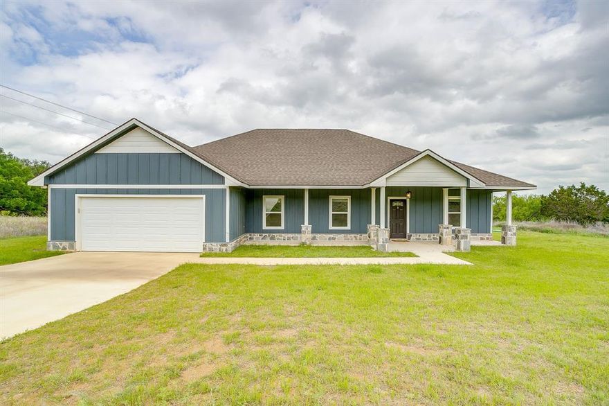 Escape to the tranquility of country living with this stunning ranch-style home, built in 2023, and nestled on just over 3 acres of land ready for your imagination. Featuring 3 spacious bedrooms, 2 well-appointed bathrooms, and a versatile office or bonus room, this home offers the perfect balance of comfort and functionality.  The primary bath features double shower heads, double vanities and a extra large walk in closet you will love! The open floor plan creates a welcoming atmosphere, ideal for both everyday living and entertaining. Custom epoxy-coated concrete flooring adds a touch of modern style and durability, while the vaulted ceiling in the living room creates an airy, expansive feel. Ceiling fans throughout the home enhance the cool, breezy environment, ensuring comfort in every room. This home also boasts a large utility room, perfect for laundry and extra storage, as well as a walk-in pantry that offers ample space for your kitchen essentials and more.  Step outside to enjoy the serene beauty of over 3 acres of country space, perfect for gardening, outdoor activities, or simply enjoying the peaceful surroundings. Whether you're looking for a peaceful retreat or a spacious home for your family to grow, this charming country property is ready to welcome you.  Close enough to town for the essentials but private enough to get away from it all.