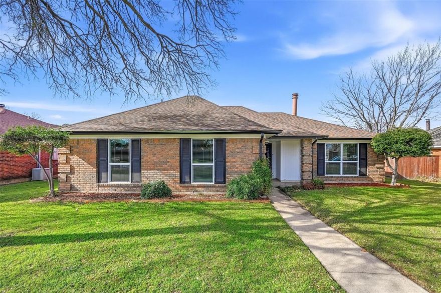 Welcome to this beautifully single-story brick home in the heart of Allen, TX, zoned to highly acclaimed Allen ISD. Luxury vinyl plank flooring flows throughout a thoughtfully designed floor plan featuring two distinct living areas, offering flexibility for entertaining, relaxing, or working from home. The main living room showcases a vaulted ceiling and a striking two-sided corner fireplace that adds warmth and architectural interest, serving as a true focal point of the home. The well-appointed kitchen features stainless steel appliances, a smooth-top cooktop, abundant counter space, and generous cabinetry for effortless storage. Enjoy casual meals at the breakfast bar or host gatherings in the adjacent dining area. The private primary suite is a serene retreat with a vaulted ceiling and walk-in closet. The en-suite bath includes dual sinks and an oversized frameless shower with a recessed niche for added convenience. Secondary bedrooms are well-sized, and the updated secondary bath complements today’s modern lifestyle.
Step outside to the backyard patio—ideal for morning coffee or evening entertaining—while mature trees provide welcome afternoon shade.
Ideally located near Story Park and Celebration Park, with quick access to major roadways, shopping, and dining, this move-in-ready home offers comfort, style, and an unbeatable location. Don’t miss the opportunity to make this exceptional Allen home yours.
To help visualize this home’s floor plan and to highlight its potential, virtual furnishings may have been added to photos found in this listing.