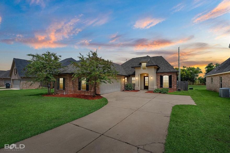 NEW interior paint!! Located in North Bossier's desirable gated community of Cypress Bend Garden District, this beautiful custom-built home features a true open concept layout and a bayou view with no neighbors behind!! The spacious living room boasts a wall of windows providing great natural light, wood flooring, crown molding and flows into the large kitchen with a massive granite island and ample cabinet space. The master suite is spacious and features a separate large tub, separate shower and separate vanities with access to the laundry room. This home's mud room makes the perfect office space with a built-in desk. The garage is oversized with storage! You do not want to miss this fantastic opportunity! Call today for your private viewing!