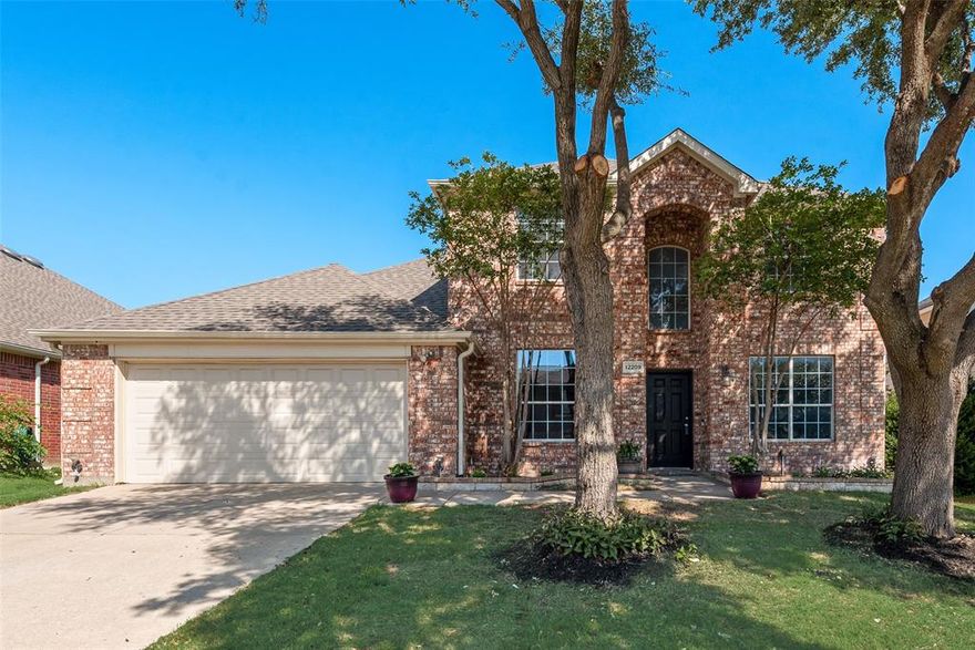 Beautifully updated 4-bedroom, 2.5-bathroom home in popular Villages of Woodland Springs! New luxury vinyl plank flooring installed in September 2025 leads into the formal living and formal dining rooms, creating the perfect spaces for entertaining. The spacious family room is anchored by a stunning newly remodeled floor-to-ceiling stacked stone fireplace, adding warmth and style to the heart of the home. The chef’s kitchen has been beautifully updated with white cabinetry, granite countertops, stacked stone backsplash, and new stainless steel appliances. Relax in the downstairs primary suite featuring a spa-inspired ensuite bath complete with a custom dual sink vanity with granite countertops, freestanding soaking tub, separate shower, and walk-in closet. The large game room upstairs offers the ideal setup for movie nights, game nights, or a second living area, while the three secondary bedrooms are all generously sized. Additional updates include fresh paint throughout and new carpet installed in September 2025. You'll enjoy the large backyard with an 8-foot privacy fence, perfect for relaxing, pets, or play. Residents of Villages of Woodland Springs enjoy exceptional amenities including 6 community pools, an amenity center, sand volleyball, basketball and tennis courts, parks, playgrounds, and miles of scenic walking trails. Fantastic location close to I-35W and Hwy 170 with premier shopping, dining, and entertainment nearby! Northwest ISD!