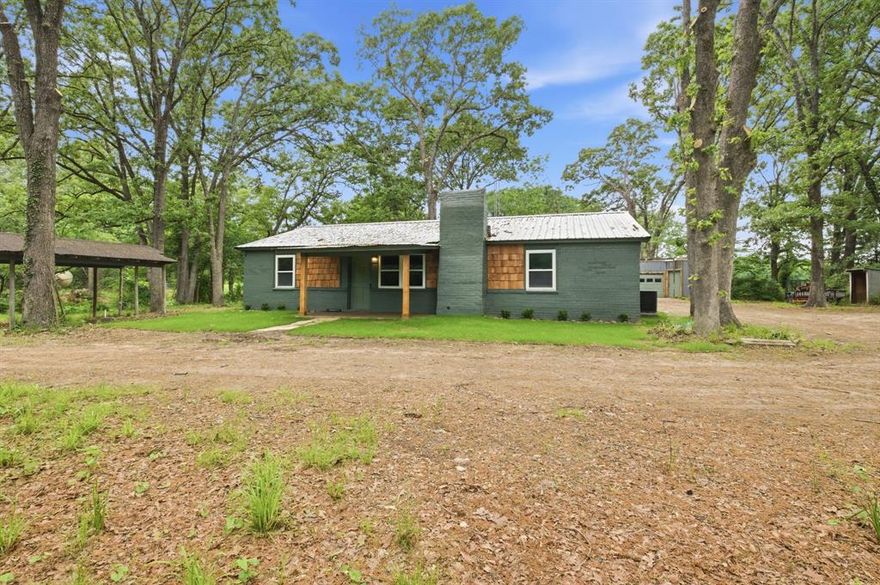 Charming home in the country sitting on 5.53 acres five minutes from the acclaimed new Bois d Arc lake - about an hour northeast of the DFW area.  Nestled in the trees, this updated three-bedroom, two bath home features an open living, kitchen, and dining area and has the FEEL of a cozy mountain cabin.  Enjoy the new kitchen with lots of storage and counter space, including a large island and new appliances - refrigerator, dishwasher, microwave, and stove.  Both bathrooms have been remodeled.  Large laundry area with abundant storage just off the kitchen.  Primary suite is separated from the other two bedrooms.  Fresh paint inside and out.  

Relax on either the front or back covered porch or fish in the pond at the back of the property.  Lots of options with this property - a quaint family home, a perfect weekend getaway given its close proximity to Dallas, or ideal for someone who wants to have a mini-farm.  

The property has several outbuildings including a 30' x 16' shop with electricity, a two-story shed 22' x 12' with electricity and an AC unit, another small outbuilding for storing lawn equipment, and a separate carport.  If you are looking for a country retreat, you owe it to yourself to look at this one!