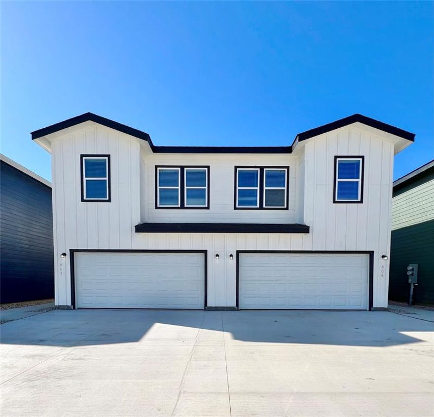 **1st promotion, $1250 off first full month's rent with a November 30th move in date**

**2nd promotion, half off first full month's rent with a Dec 15th move in date**

Welcome to this brand-new duplex in the heart of Burleson, featuring a beautifully designed 3-bedroom, 2.5-bath layout. This home boasts a thoughtful floor plan with modern finishes, granite countertops, luxury vinyl plank flooring, and stylish details throughout. Upstairs, you’ll find two spacious bedrooms with plush carpeting and generous closet space. The primary suite offers a large walk-in closet and an ensuite bathroom complete with a double vanity and private water closet.

Set on a spacious lot with plenty of green space, the property provides a peaceful and inviting atmosphere. Residents will enjoy convenient access to nearby shopping, dining, schools, and major employers, along with easy connectivity to Fort Worth and surrounding areas via nearby highways. With its contemporary design and prime location, 3501 E Renfro St delivers comfort, convenience, and exceptional modern living in Burleson.
*$100 water charged to tenant every month
*water held in HOA name