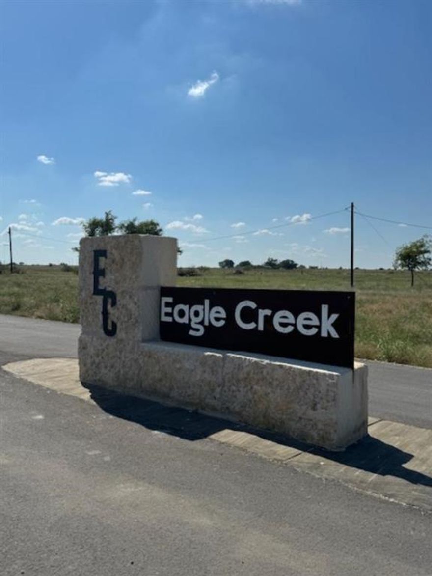 Welcome to Eagle Creek a hidden gem in northern Godley, featuring just 23 large lots ranging from approximately 1 to 5 acres, allowing owners to bring their own builder! NO HOA! This is your chance to own a beautiful building site in the development. Perched on a serene, gently rolling acreage, this parcel offers peace, privacy, and exceptional potential for your dream home! Country ambiance, convenient access to rural setting with easy access to CR 913 and FM 2331. Minimal restrictions and maximum freedom! Build as you envision! Community size is just 23 lots in total, giving this development a private, boutique feel. Scenic views & natural setting with mature trees, gentle topography and open sky views. Eagle Creek is purposely small and thoughtfully laid out, giving owners more space and privacy. The area is part of a growing region with access to amenities, schools, and more, while still offering that countryside lifestyle! Ideal for those building their forever home away from the hustle and bustle. Plenty of room for the freedom to build your own dream home, workshop, pool and guest quarters! Perfect for buyers who want their own architectural freedom and room to expand or customize!