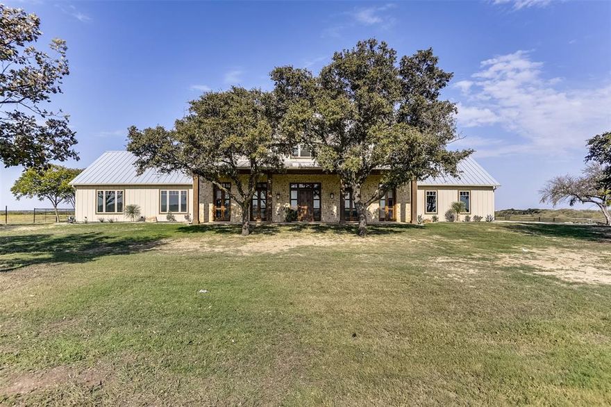 Your perfect home awaits on + or -237 gorgeous acres in Bristol, TX; just 30 minutes South of Dallas! This barely-lived-in masterpiece offers an exceptional standard of living with its expansive split-bedroom layout, ensuring privacy for residents & guests. The floor plan boasts wide, airy rooms flooded with natural light, while multiple living areas provide abundant space for relaxation & entertainment. Let's not forget the kitchen-a culinary dream equipped with top-of-the-line appliances & elegant finishes. Step outside to take in the gorgeous views from the magnificent porch & feel the gentle breeze. For equestrian enthusiasts, ranchers or hobby farmers, the property boasts a barn & equipment barn, alongside loafing sheds. With vast pasture areas & wildlife, your opportunities are endless. The property is fenced & cross-fenced, ideal for managing livestock. The 17-acre lake is the perfect backdrop for evening reflections or hosting splendid gatherings.