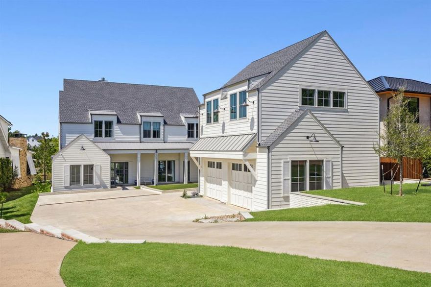 Set on the water with peaceful cove views, this custom home is designed for laid-back luxury. The open-concept great room connects seamlessly to a large covered patio with Phantom screens, fireplace, and dedicated living and dining areas—perfect for indoor-outdoor entertaining. Inside, an oversized island anchors the kitchen, with custom furnishings and designer fabrics elevating every space. A game room upstairs opens to a covered balcony overlooking the pool and spa, and separate guest quarters over the garage offer added flexibility for hosting. Fully furnished and move-in ready.