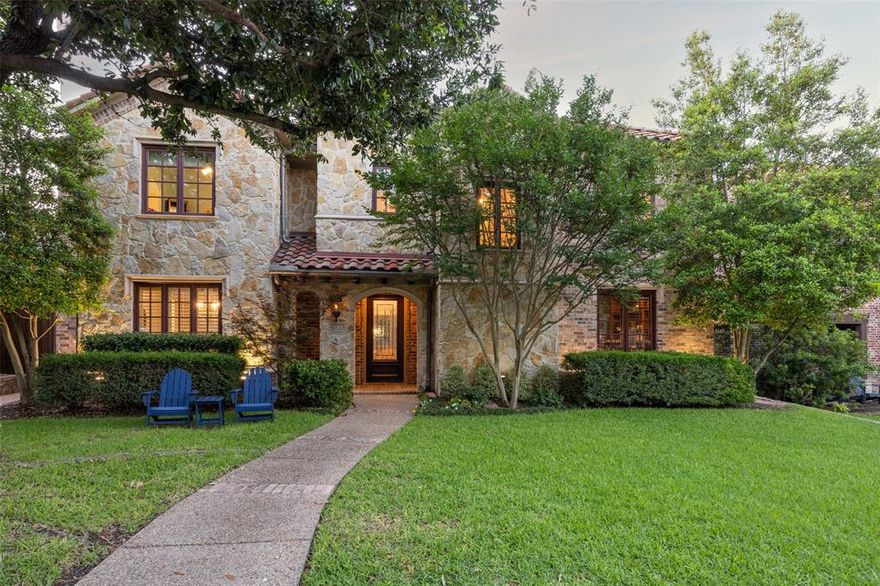 Located within walking distance of Lakewood Elementary, this stunning home has been thoughtfully remodeled by Rosewood’s Homesmith, blending sophisticated design with everyday comfort. Featuring all-new designer appliances & elegant finishes throughout, this residence is ideal for families & entertainers alike. Formal entry opens to a refined dining area & spacious living room, where a soaring two-story ceiling, dramatic wall of windows, sleek gas fireplace, & stylish wet bar create a welcoming atmosphere for gatherings. Entertainer’s dream kitchen is a true showstopper—complete with built-in refrigerator, gas cooktop, double ovens, oversized island, abundant cabinetry, walk-in pantry & dedicated cocktail & wine bar—perfect for hosting holiday dinners & casual celebrations. Upstairs, the luxurious primary suite offers a serene retreat with its cozy gas fireplace, trayed ceiling & spa-like en-suite bathroom featuring separate vanities, soaking tub, frameless glass shower with dual rainfall heads & spacious walk-in closet. A 2nd living area with its own wet bar, 3 additional bedrooms with 2 connecting bathrooms & convenient laundry room complete the upper floor. The oversized game room is versatile & inviting, while the 5th bedroom functions beautifully as a media room or 2nd playroom. A downstairs guest suite provides comfort & privacy for visitors & dedicated home office makes working from home effortless. Step outside into your inviting backyard retreat, where a built-in grilling station sets the stage for summer BBQs. Relax by the firepit, take a dip in the sparkling pool & spa, or unwind with a glass of wine after a long day. Perfectly situated in a family-friendly location, this home is just steps from the school playground, soccer fields & basketball courts. For weekend adventures, enjoy easy bike rides to White Rock Lake for picnics & scenic outings. This exquisite home seamlessly blends comfort, functionality & luxury—don’t miss your chance to make it yours!