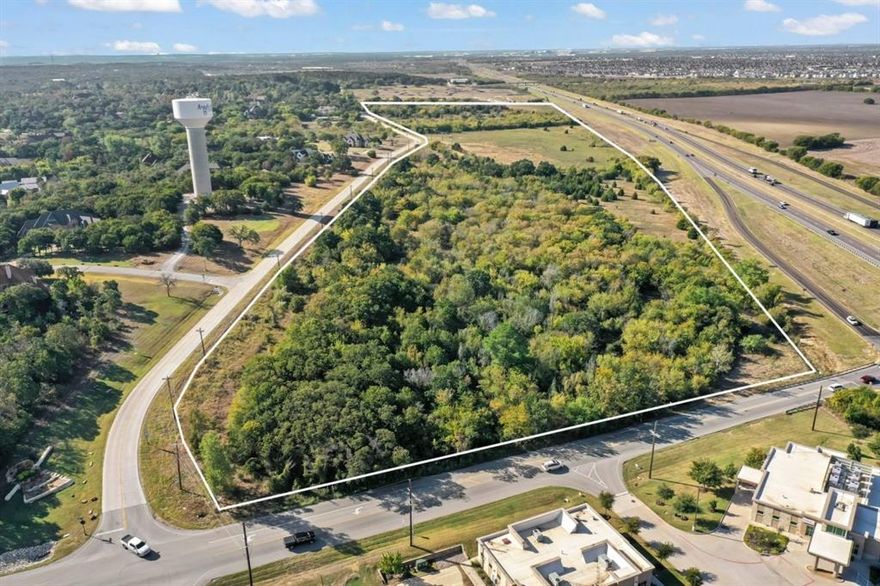 Approximately 48.07 acres on I35W in Argyle, TX.  Property has a hard corner at Crawford Road and I35W and backs up to C.Taylor Road.  This is a high-traffic area with tons of growth and development.  Currently zoned PD for Retail or Commercial use. Argyle water is available. Contract let date of December 2027 per TxDot for the service road.  Planned Development needs to go through City of Argyle.

There is another listing for only the top 10 acres of this property. It's priced $22 persq ft for a total of $9,583,200 See MLS #20940880