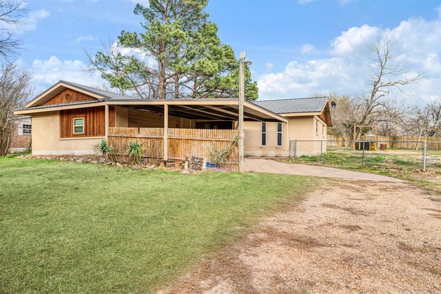 Peaceful Country Living on .51 Acres!Welcome to this charming 3-bedroom, 2-bath home nestled on a quiet country road in Lamar County. Situated on approximately .51 acres, this property offers the perfect blend of comfort, functionality, and outdoor space.The home features a 2-car garage plus a spacious 2-car carport across the front, providing ample covered parking for family and guests. Inside, you’ll find a comfortable layout ideal for everyday living.Step outside to enjoy the fully fenced yard, perfect for pets, kids, or gardening. The backyard also includes a storage building for your tools and equipment, along with a private well for outdoor watering, helping keep your landscape green while saving on water costs.If you’ve been looking for a property that offers quiet country surroundings with practical amenities.