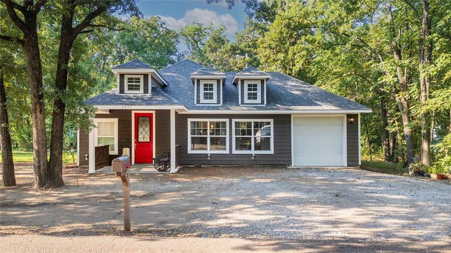 Welcome to your getaway at 2435 Live Oak Street in charming Quinlan, TX. This like-new custom construction sits on a corner lot, offering a harmonious blend of contemporary design and natural beauty. Step inside to discover a modern, open floor plan that’s both inviting and functional. With 3 spacious bedrooms and 2.5 full baths. The custom and intricate ceilings in the bedrooms and living room create an airy and elegant atmosphere. The heart of the home is the kitchen, equipped with sleek granite countertops, an island, and electric appliances, ideal for culinary adventures and gatherings. A separate utility room and abundant closet space provide ample storage and convenience. Nestled around a private park and serene lake, this property boasts a peaceful setting with trees enhancing the picturesque landscape. Whether you’re enjoying a quiet morning by the water or entertaining guests in your spacious living area, this home offers a perfect balance of tranquility and modern living. Complete with a one-car garage, this property is ready to become your personal sanctuary. Come and experience the beauty and comfort of this gorgeous home in Quinlan, TX. It's waiting for you!