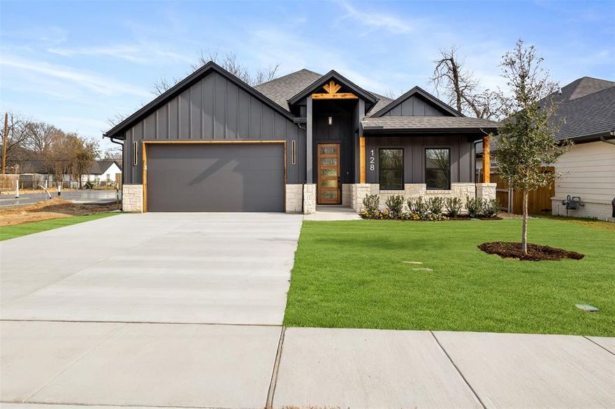 Exciting new home on Revitalized Cottonwood St. at the edge of downtown Fort Worth! Discover this beautiful and energy efficient home in a charming historic neighborhood. With full foam encapsulation and high end features throughout, this home offers the perfect blend of Modern comfort with classic appeal. Boasting 4 bedrooms and 2 full bathrooms, the open concept living area flows seamlessly into the gourmet kitchen, ideal for both entertaining and everyday living. The backyard, surrounded by mature trees, provides a peaceful retreat. An oversized garage with large attic storage is very rare, as well as a covered front porch and back patio. Inside you'll find elegant marble countertops, cathedral Ceiling, energy efficient argon windows, luxury vinyl plank flooring and a fully insulated garage door. Every detail from the thoughtfully designed kitchen to the walk-in closets offers a touch of luxury. The home is equipped with Gutters, Foundation drip line and a advanced irrigation ensuring lush , year round enjoyment of both the front and the backyard.