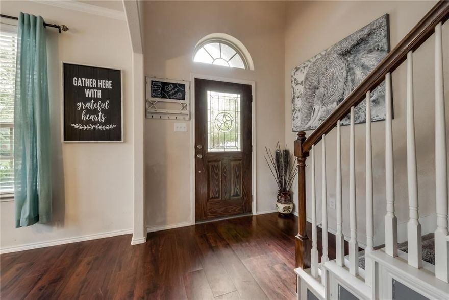 Seller is giving $10K Allowance!! This charming, cozy, & cute 5-bdrm 3-bath home is waiting for its new family. Walk into an amazing entry way with its vaulted ceilings. Formal dining or office you choose. The Owner Suite is spacious with bay windows making it a great place to unwind. Extra bonus bdrm downstairs has its own bath and big window. Perfect for in-law suite. Lg kitchen with a huge island opens to a great family rm & features ample 42-inch cabinets, ceramic tile flooring, granite counter tops and an extra-large walk-in pantry! Cozy up in the family rm with a gas fireplace & logs framed with a beautiful cast stone mantel. 3 bdrms upstairs with walk-in closets & game rm with built-in shelves & storage. Window blinds throughout the home. 2 big attics with plenty of floor space for storage and a radiant barrier to help with those bills! This beauty backs up to a greenbelt to the west. Perfect for watching the sun set on your extended covered back patio with an overhead fan.